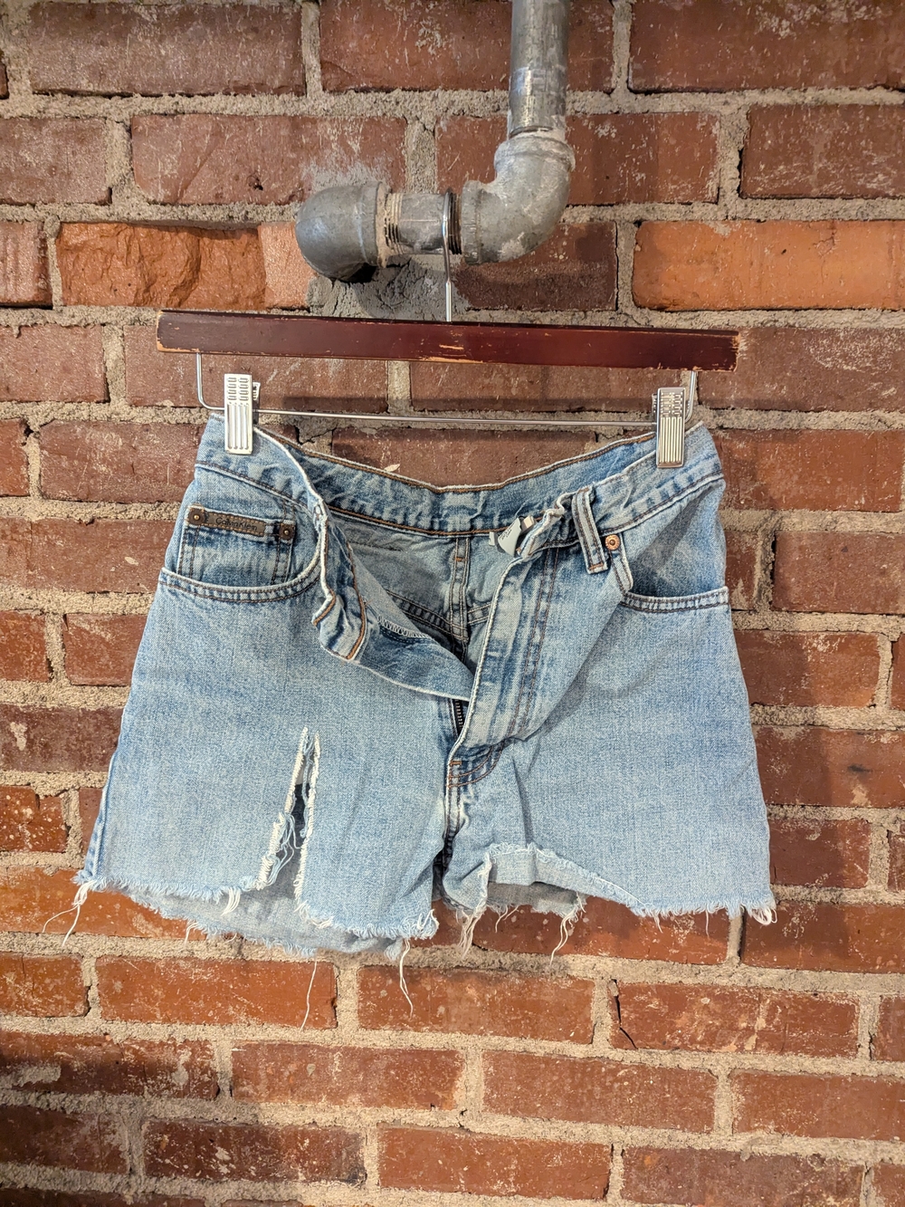 Calvin Klein Light Blue Distressed Denim Cutoff Shorts